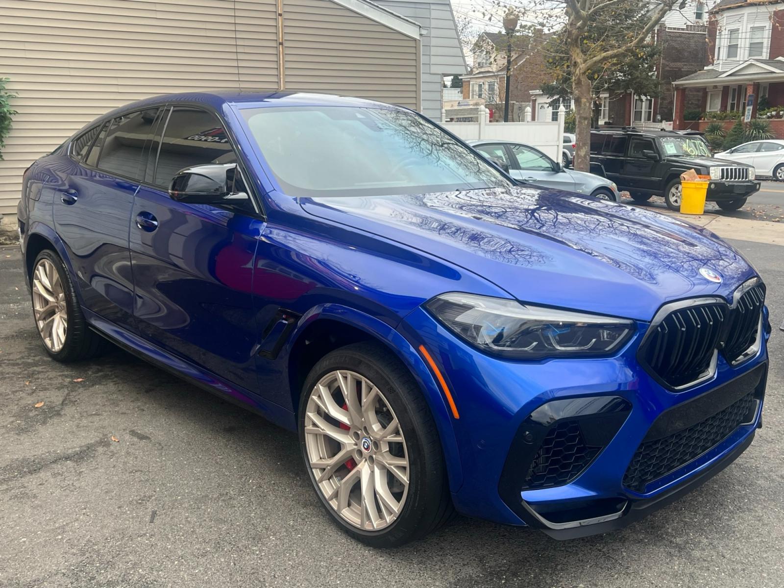 2022 Blue /Red/Black BMW X6 M Base (5YMCY0C07N9) with an 4.4L V8 DOHC 32V engine, 8A transmission, located at 1018 Brunswick Ave, Trenton, NJ, 08638, (609) 989-0900, 40.240086, -74.748085 - Holy Cow and Wow!!...That is the description on this absolutely stunning BMW X6 M Competition! Ordered by Anthony himself with the best color choice of Marina Bay Blue metallic and Red Interior to stand out on the road and to any enthusiast of the BMW X series! Executive Pkg. includes Remote Start, - Photo #24
